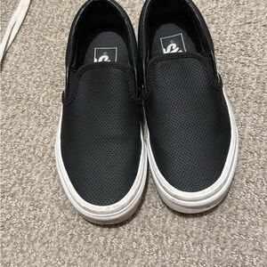 Vans Black and White Slip-On Sneakers